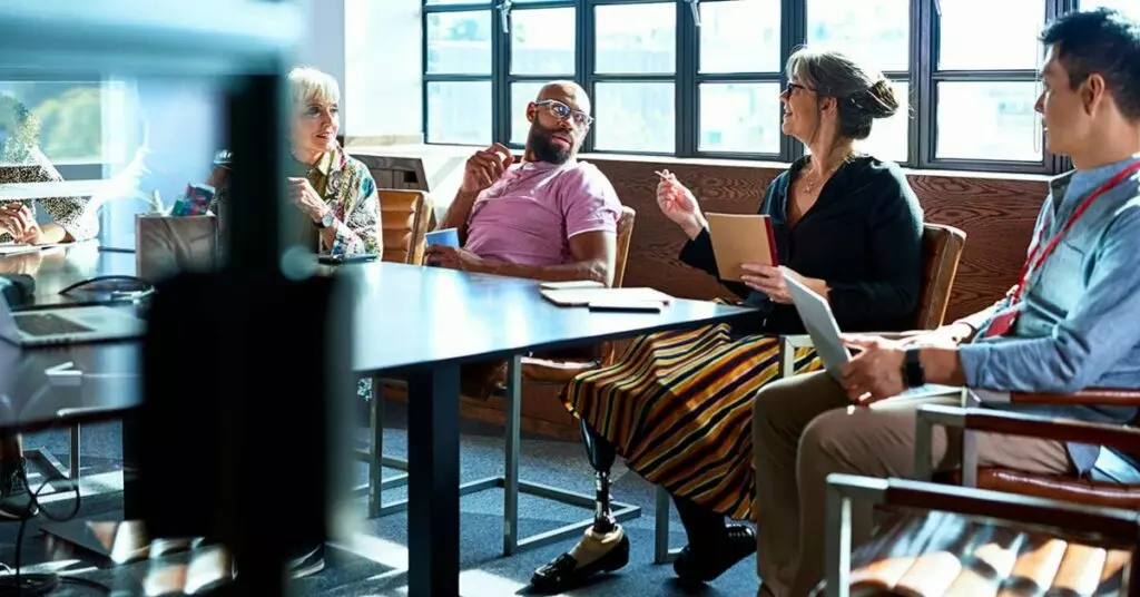 Diverse group of people engaged in cryptocurrency trading.